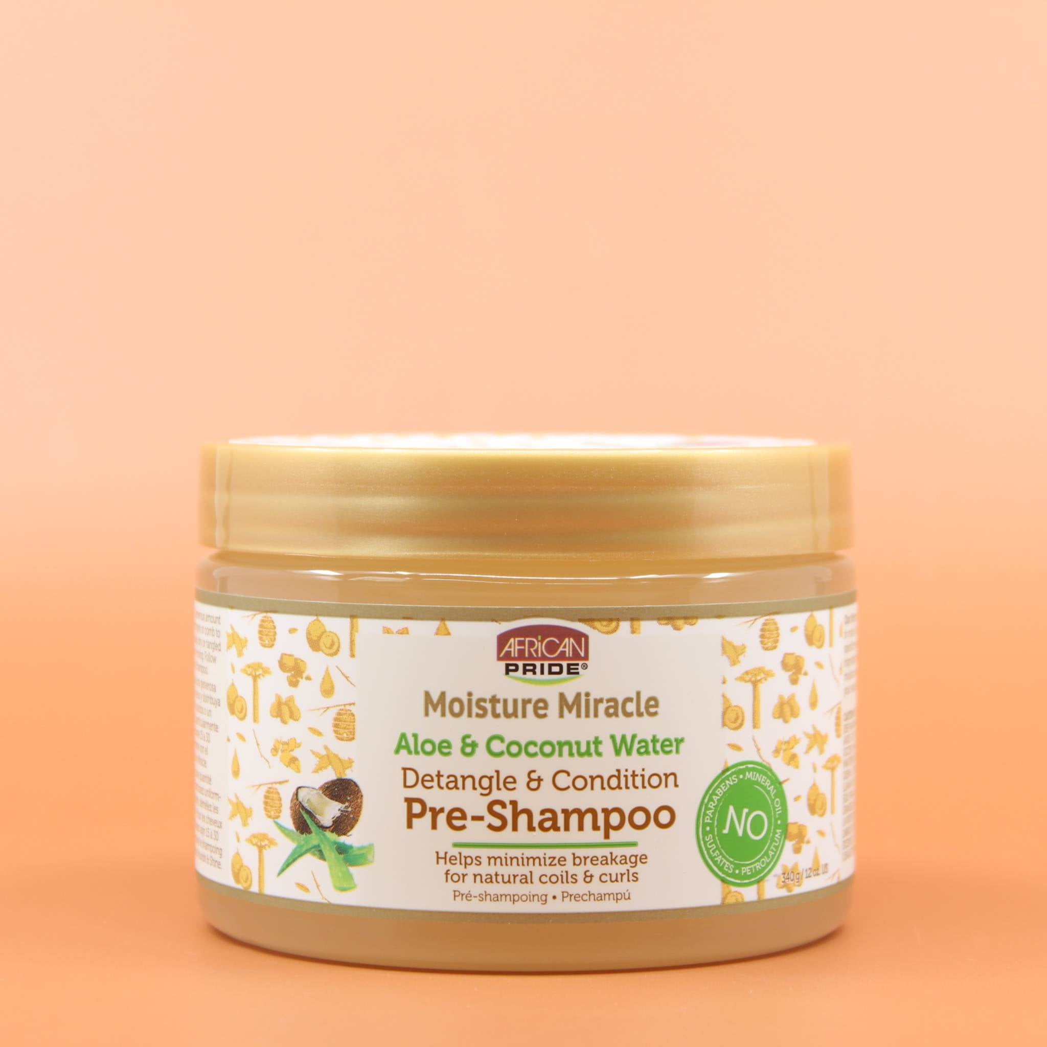 AFRICAN PRIDE Aloe & Coconut Water Pre-Shampoo Vorderansicht vor einem Braun-Organgen Hintergrund
