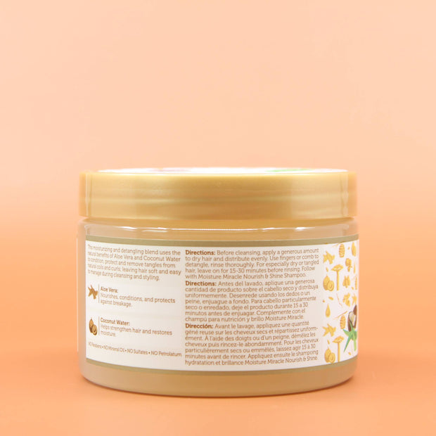 AFRICAN PRIDE Aloe & Coconut Water Pre-Shampoo Rückansicht  vor einem Braun-Organgen Hintergrund