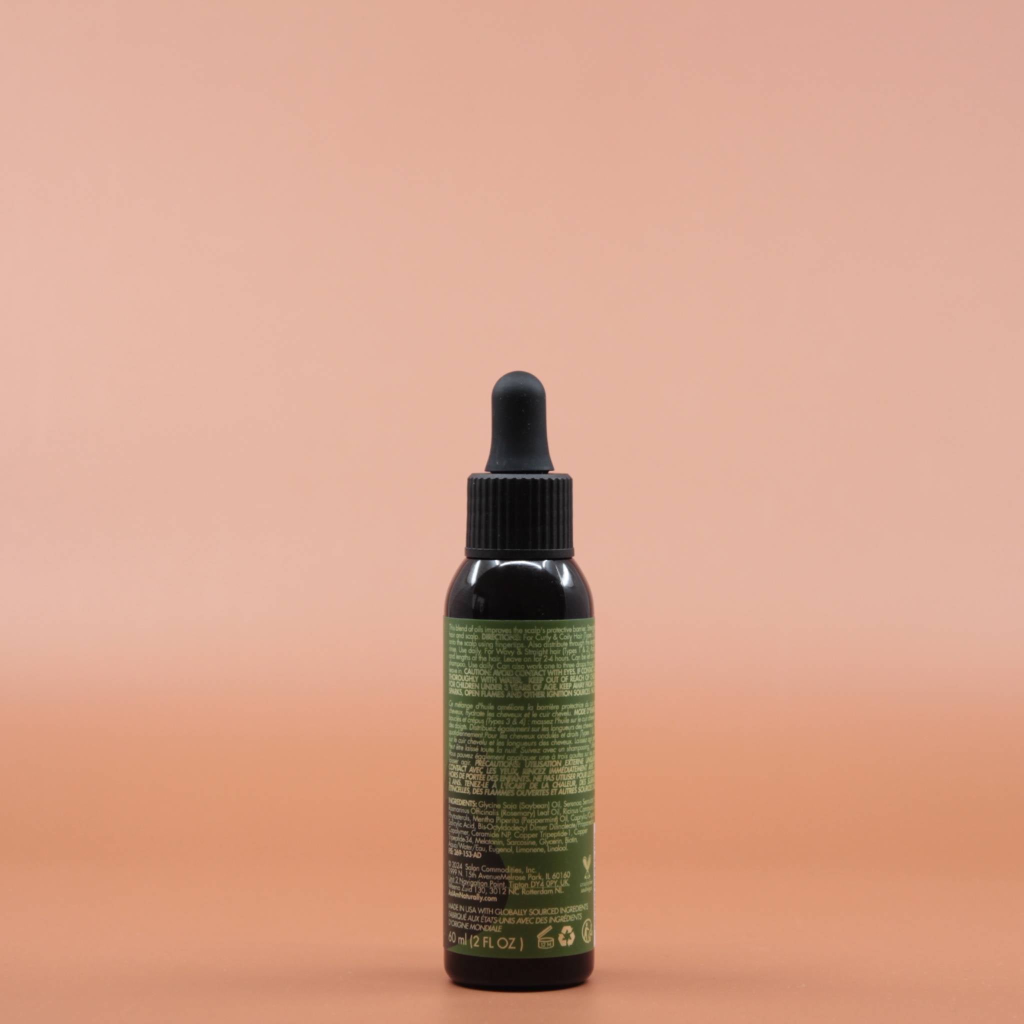 Das Haarpflegeprodukt AS I AM Rosemary Oil 60ml in der Rückansicht vor einem braun-orangen Hintergrund.
